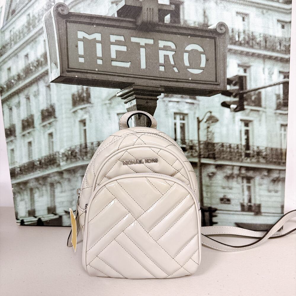 NWT Michael Kors Abbey XS Backpack 35T0SAYC8L Aluminum Quilted Patent Crossbody